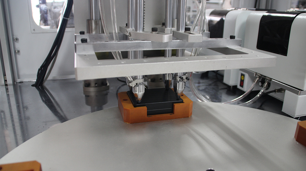 Rotary multi head screw machine